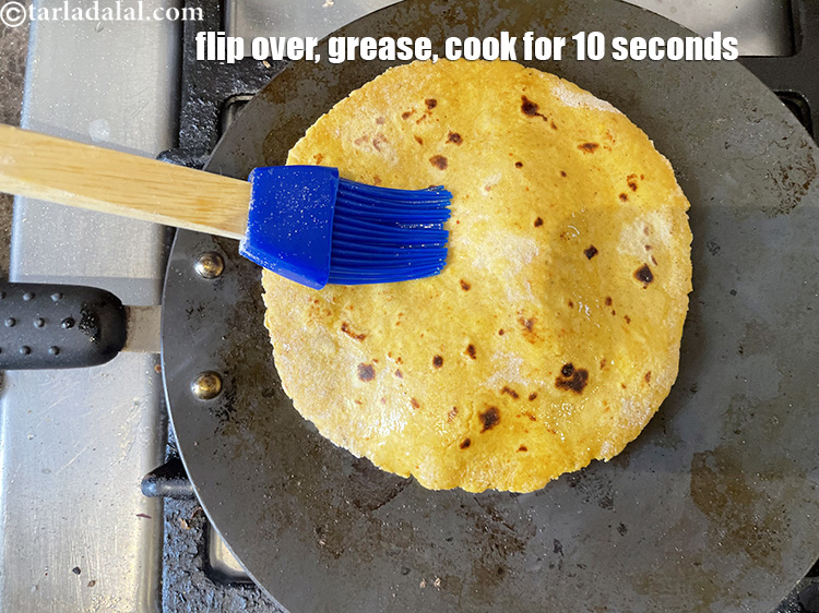 Step 28 – Flip over.&nbsp;Grease again and cook for 10 seconds.