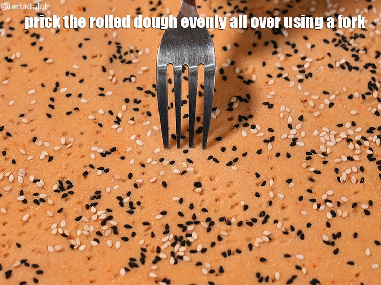 Step 24 – <p>Prick the rolled dough evenly all over using a fork.&nbsp;</p>