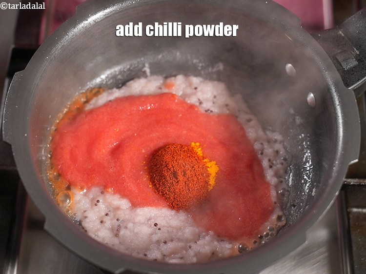 Step 23 – Add 1 tsp <a href="https://www.tarladalal.com/glossary-chilli-powder-red-chilli-powder-339i">chilli powder</a>.