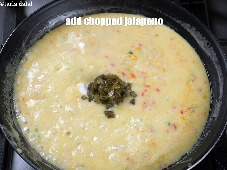 Step 23 – Add 2 tbsp <a href="https://www.tarladalal.com/glossary-chopped-jalapenos-1242i">chopped jalapeno</a>.