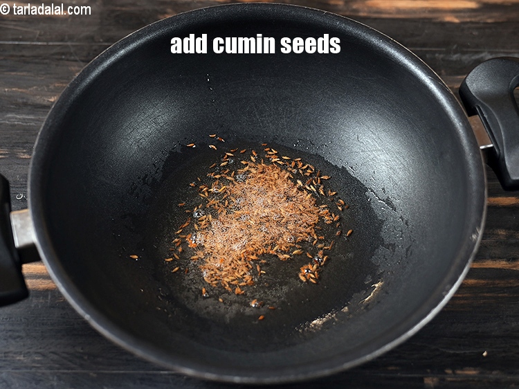 Step 23 – Add 1 tsp <a href="https://www.tarladalal.com/glossary-cumin-seeds-jeera-zeera-381i">cumin seeds (jeera)</a>.
