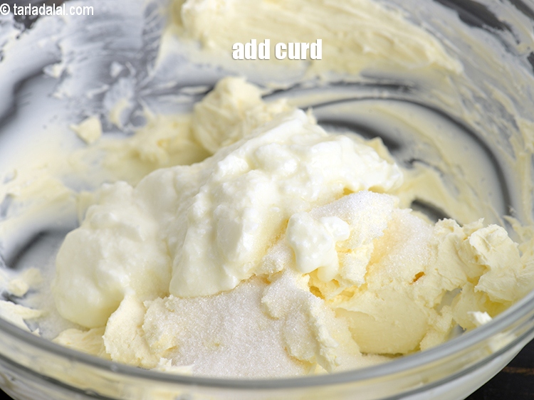 Step 24 – Add 3 tbsp <a href="https://www.tarladalal.com/glossary-curd-dahi-yogurt-yoghurt-383i">curd</a>.