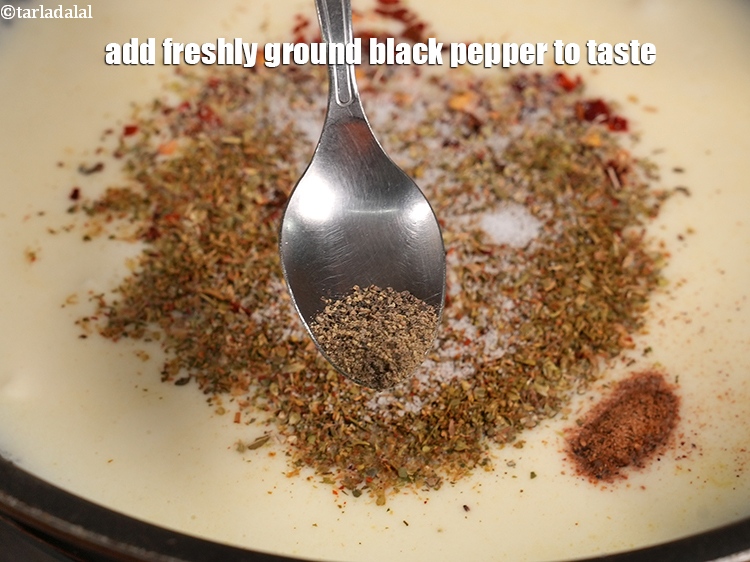 Step 23 – Add <a href="https://www.tarladalal.com/glossary-freshly-ground-black-pepper-kalimirch-powder-kali-mirch-ka-powder-567i">freshly ground black pepper (kalimirch)</a> to taste.
