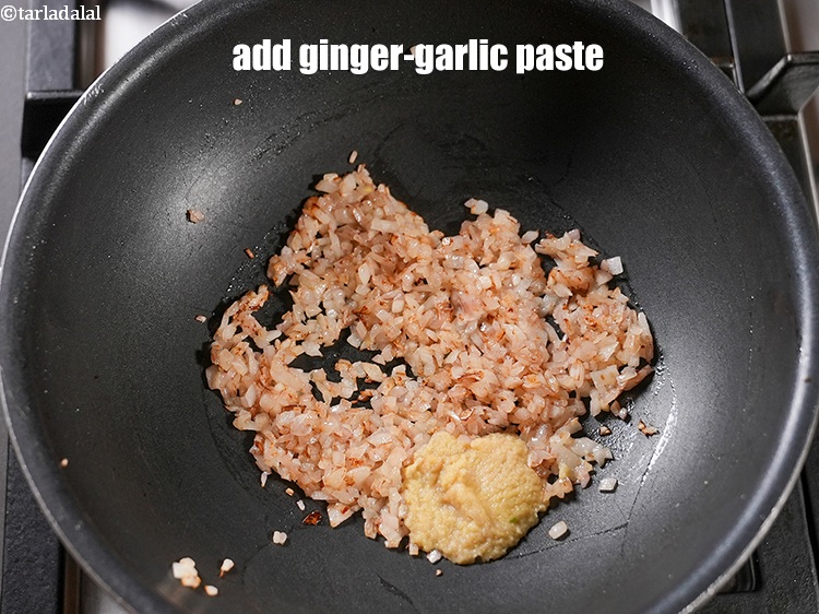 Step 23 – Add 2 tsp <a href="https://www.tarladalal.com/glossary-ginger-garlic-paste-adrak-lehsun-ki-pate-adrak-lahsun-ki-paste-939i">ginger-garlic (adrak-lehsun) paste</a>.