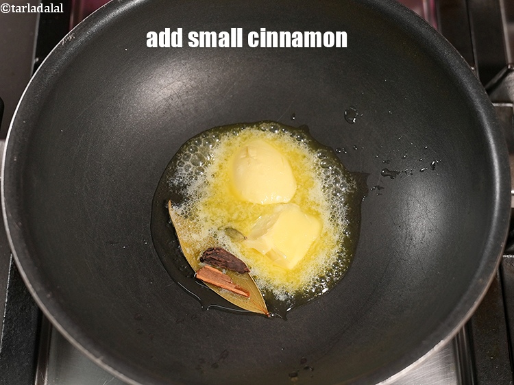 Step 23 – Add 1 small <a href="https://www.tarladalal.com/glossary-cinnamon-dalchini-346i">cinnamon (dalchini)</a>.