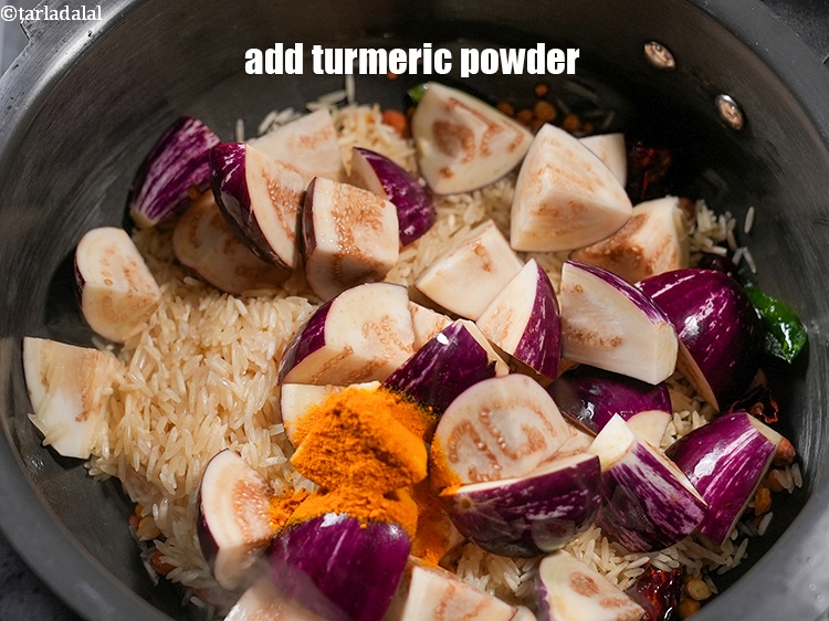 Step 23 – Add &frac14; tsp <a href="https://www.tarladalal.com/glossary-turmeric-powder-haldi-645i">turmeric powder (haldi)</a>.