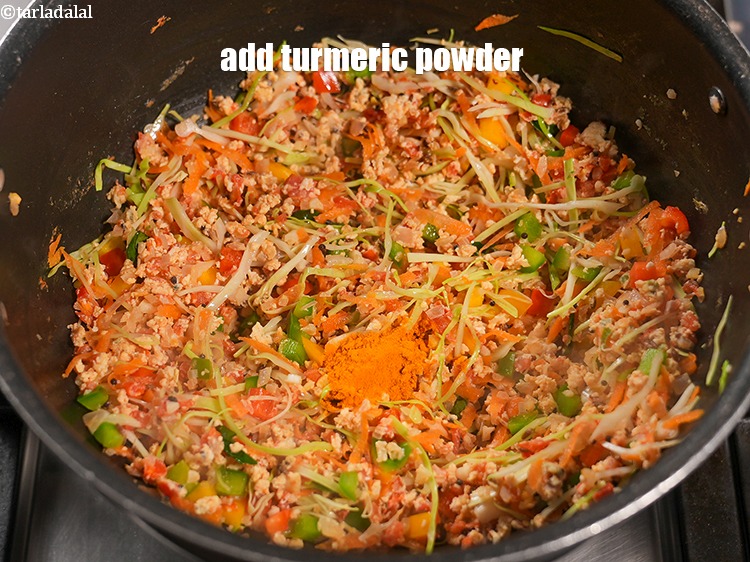 Step 23 – Add &frac12; tsp <a href="https://www.tarladalal.com/glossary-turmeric-powder-haldi-645i">turmeric powder (haldi)</a>.&nbsp;