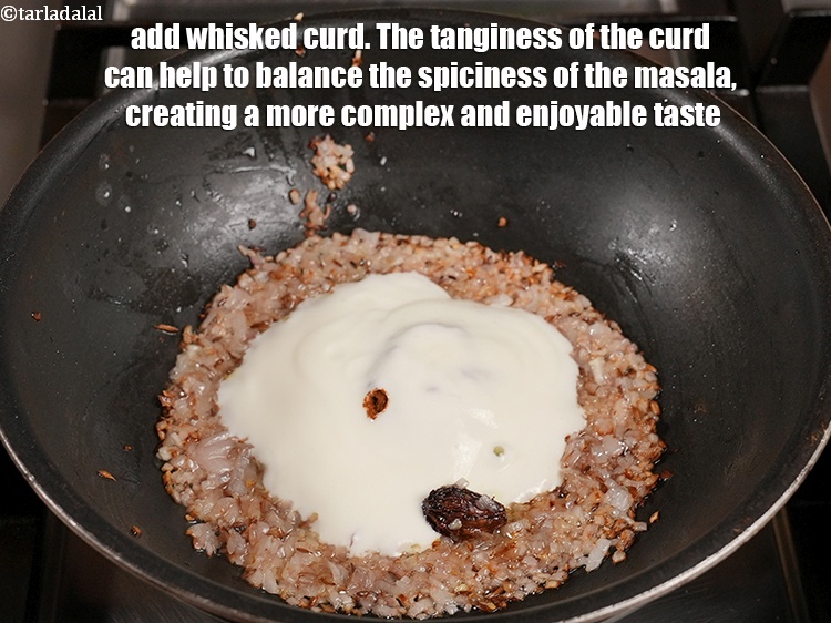 Step 23 – Add &frac14; cup whisked <a href="https://www.tarladalal.com/glossary-curd-dahi-yogurt-yoghurt-383i">curd (dahi)</a>. The tanginess of the curd can help to …
