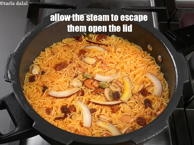Step 23 – Allow the steam to escape before opening the lid.