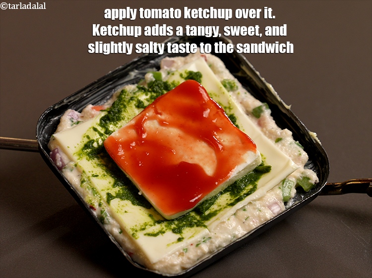 Step 23 – Apply 1 tsp <a href="https://www.tarladalal.com/glossary-tomato-ketchup-tomato-sauce-181i">tomato ketchup</a>&nbsp;over it. Ketchup adds a tangy, sweet, and slightly salty …