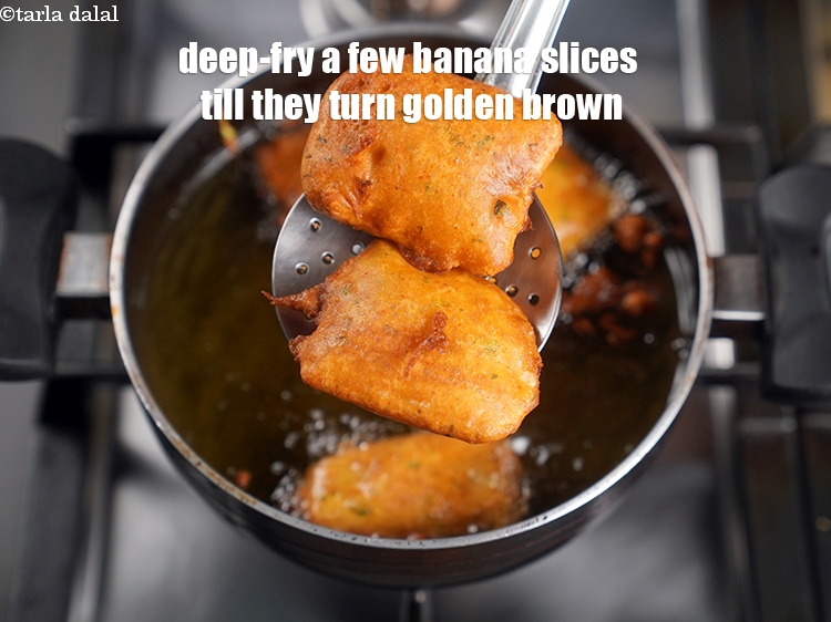 Step 24 – Deep-fry a few banana slices at a time on a medium flame, till they turn …