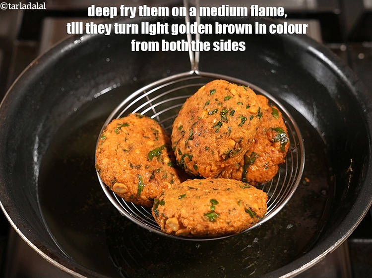 Step 23 – Deep fry them on a medium flame, till they turn light golden brown in colour …