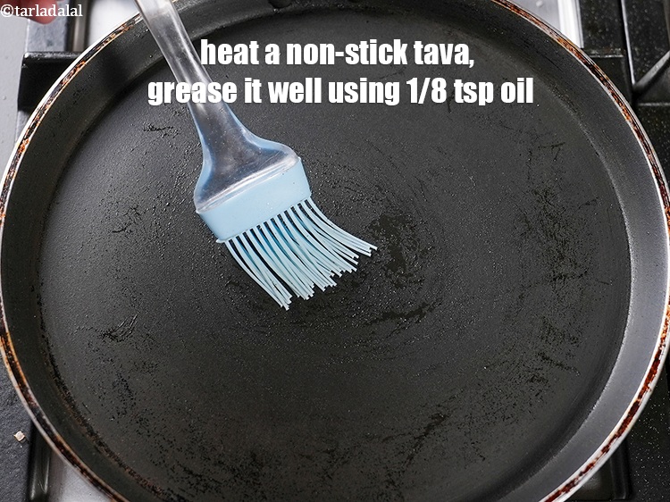 Step 23 – Heat a non-stick tava, grease it well using 1/8 tsp oil.