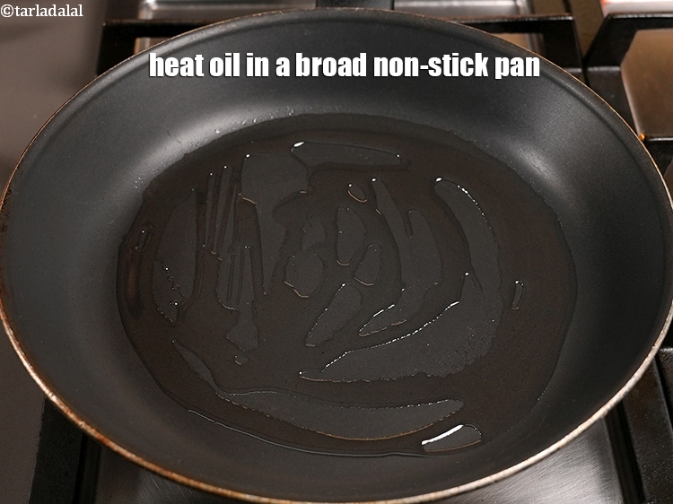 Step 23 – Heat 1 tbsp oil in a broad non-stick pan.