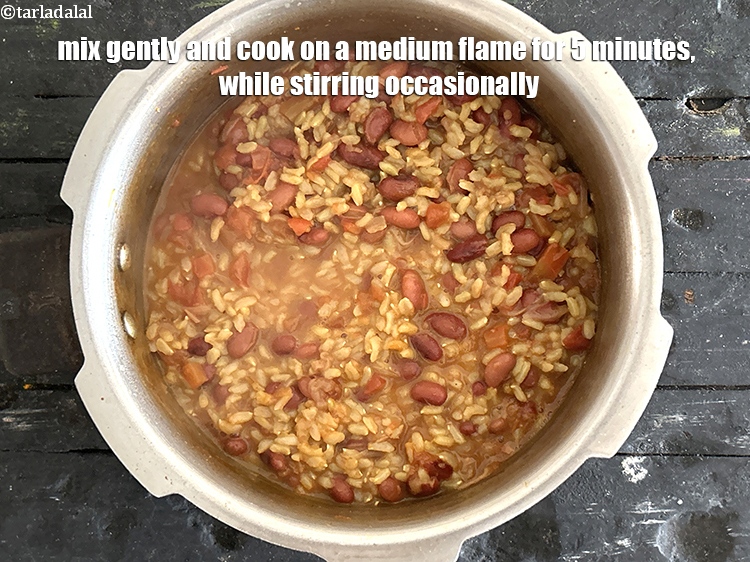 Step 27 – Mix gently and cook on a medium flame for <strong>5&nbsp;minutes,</strong> while stirring occasionally.