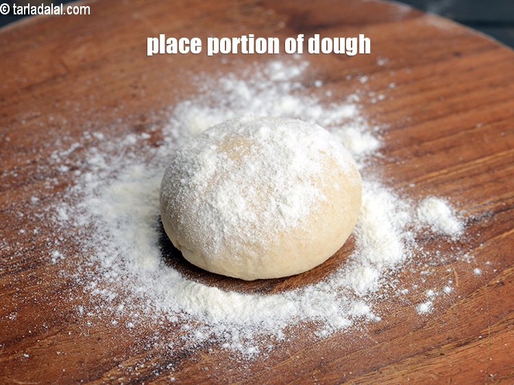 Step 24 – Place a portion of the dough.<br /> &nbsp;