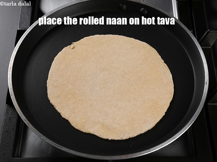 Step 23 – Heat a non-stick tava (griddle) and place the rolled naan.