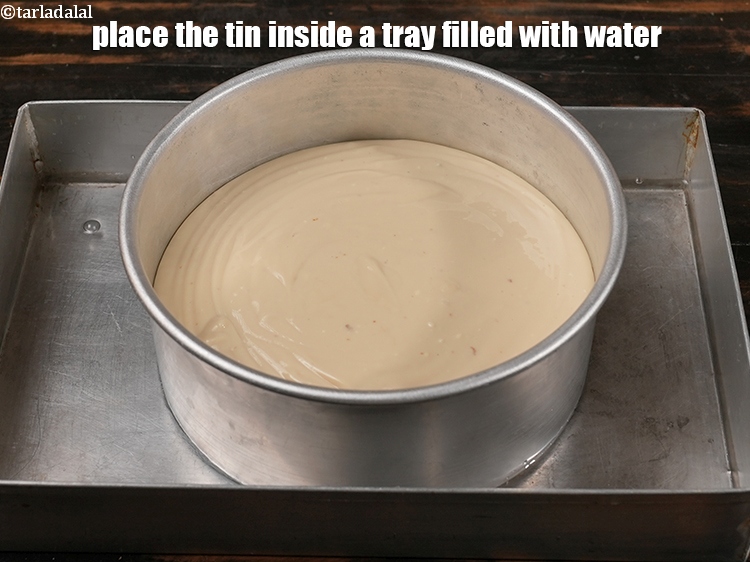 Step 23 – Place the tin inside a tray filled with water.