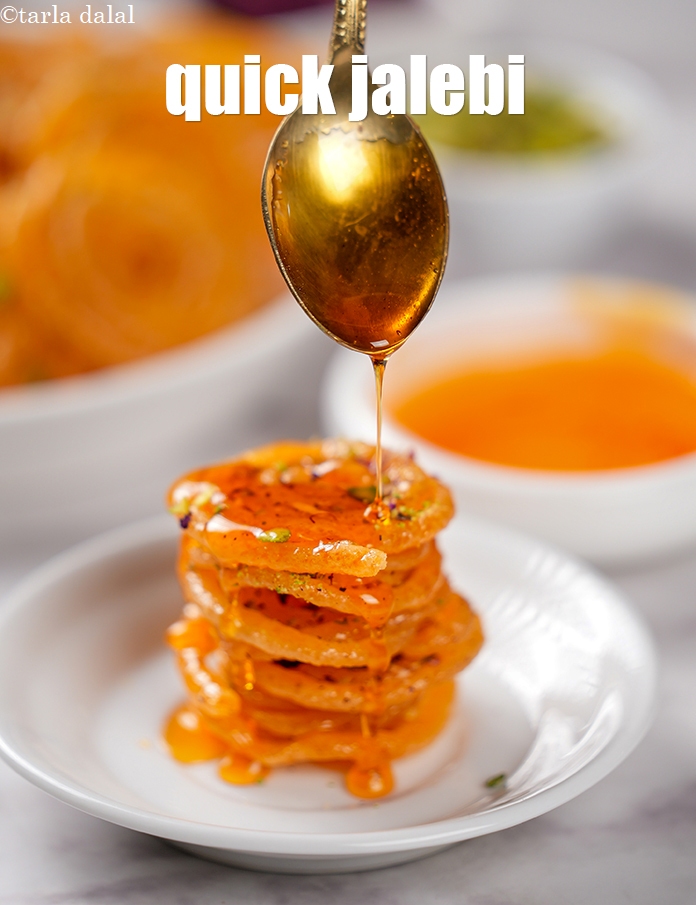 Step 25 – Serve the <strong>instant jalebis</strong> hot garnished with almonds and pistachios.