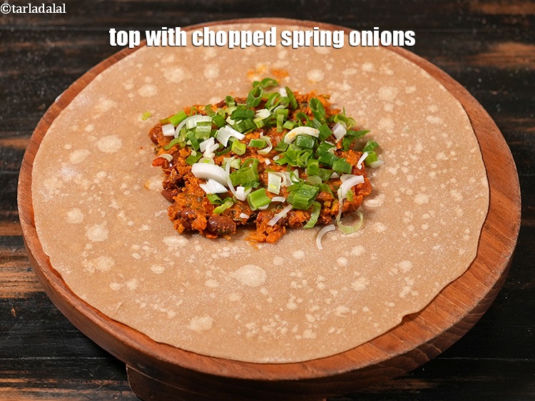 Step 42 – <meta charset="UTF-8" />Sprinkle some chopped spring onions.