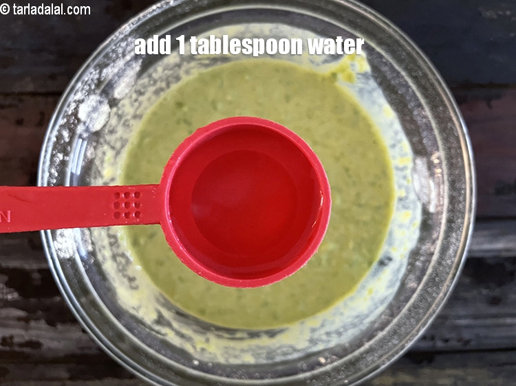 Step 42 – Add 1 tbsp of water. Water is added to make the dhokla soft and&nbsp;&nbsp;smoother on …