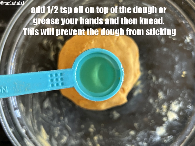 Step 23 – Add 1/2 tsp oil on the top of the dough or while kneading the dough …