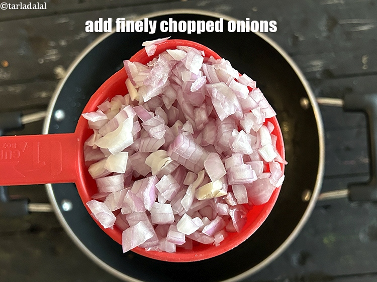Step 23 – <html><head></head><body><p>Add&nbsp;1 cup&nbsp;finely&nbsp;<a href="glossary-chopped-onions-722i">chopped onions</a>.</p></body></html>