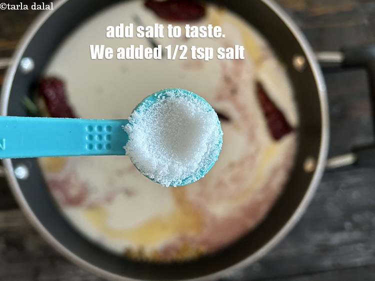 स्टेप 23 – स्वादानुसार नमक डालें। हमने 1/2 टी-स्पून&nbsp;नमक डाला है।