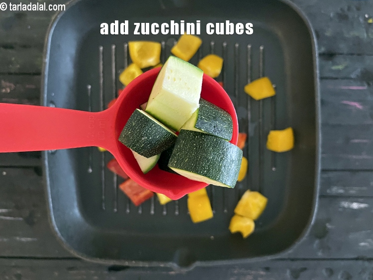 Step 23 – Add&nbsp;<meta charset="UTF-8" />1/4 cup&nbsp;<a href="glossary-zucchini-cubes-740i">zucchini cubes</a>&nbsp;, unpeeled.