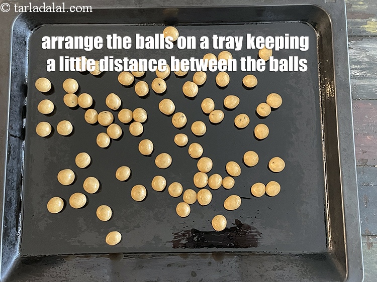 Step 23 – Arrange them on a greased baking tray.