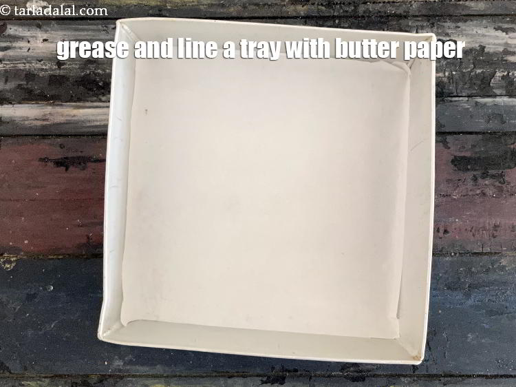 Step 23 – <meta charset="UTF-8" />Grease and line a tray with a butter paper.