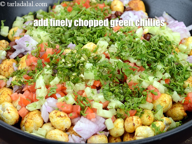 Step 24 – Add 1 tsp finely <a href="https://www.tarladalal.com/glossary-chopped-green-chilli-820i">chopped green chillies</a>.&nbsp;