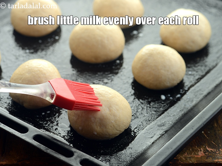 Step 22 – Brush little milk evenly over each roll.