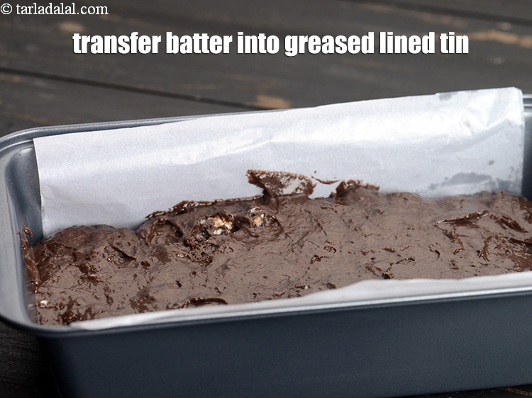 Step 24 – Transfer the batter into a greased and lined tin.