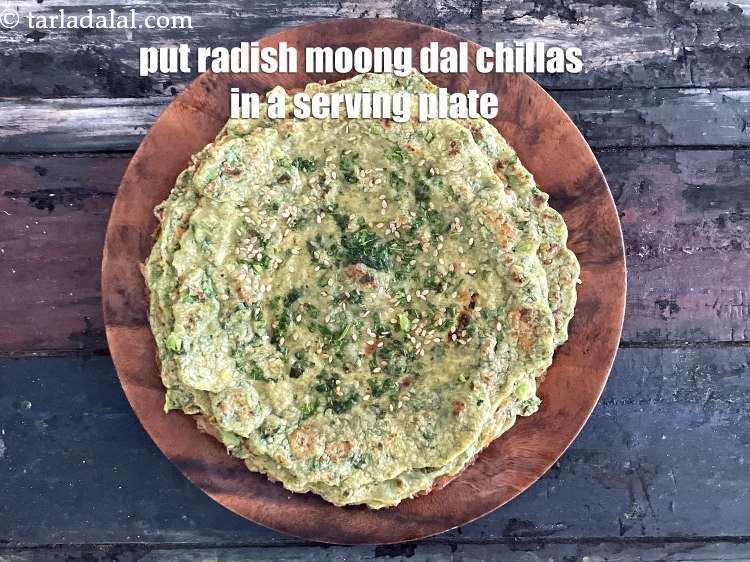 Step 34 – Put <meta charset="UTF-8" /><strong>radish moong dal chillas</strong>&nbsp;in a serving plate.