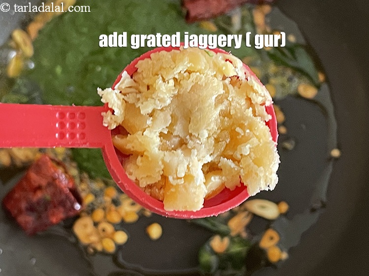 Step 23 – Add 2&nbsp;tbsp&nbsp;<a href="glossary-grated-jaggery-947i">grated jaggery (gur)</a>.