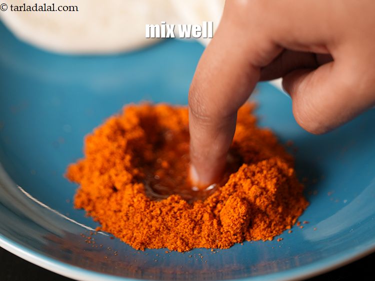 Step 27 – Mix chutney and ghee using a finger.