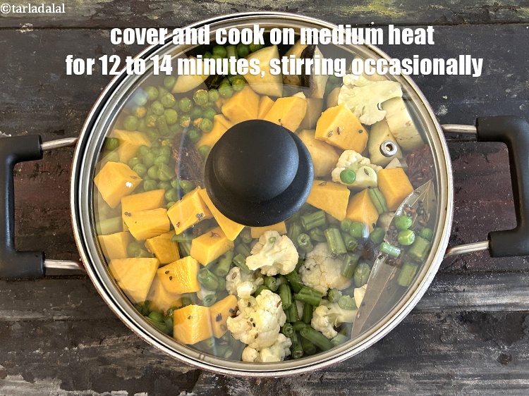 Step 23 – Cover with a lid and cook on a medium flame for 12 to 14 minutes, …
