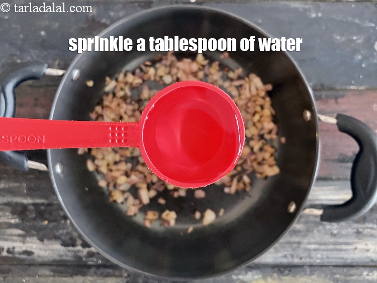 Step 23 – Sprinkle 1 tablespoon of &nbsp;water.