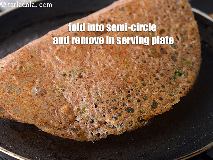 Step 23 – Fold it into a semi-circle and remove in a serving plate.
