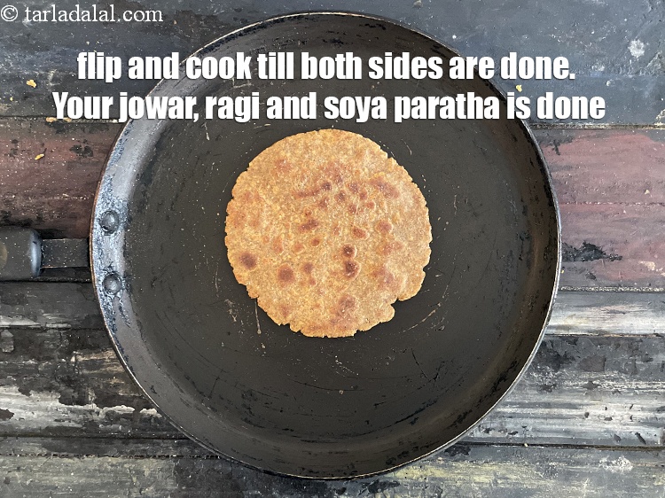 Step 25 – Flip and cook the paratha on both sides till done.