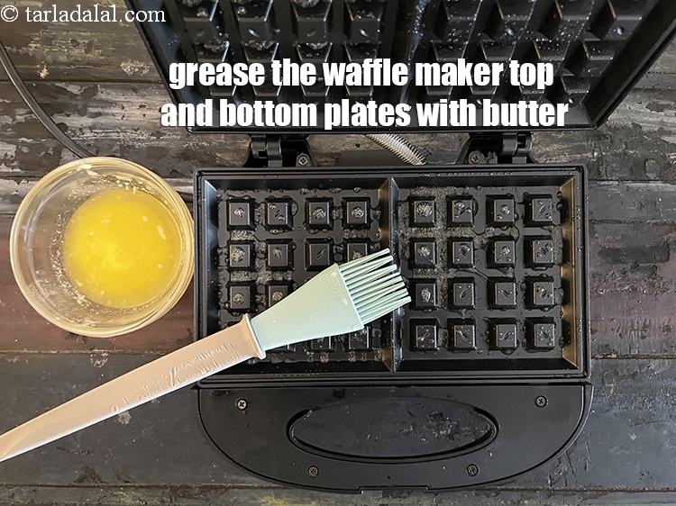 Step 27 – <meta charset="UTF-8" /> Grease the waffle maker with little butter. Grease the bottom plate and …