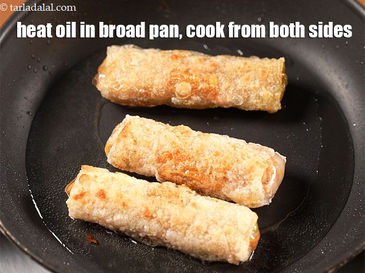 Step 24 – Heat little oil in a broad non-stick pan, cook the dumplings from both the sides …