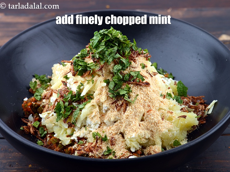 Step 23 – Add 2 tbsp&nbsp;finely&nbsp;<a href="https://www.tarladalal.com/glossary-chopped-mint-788i">chopped mint leaves (phudina)</a>.