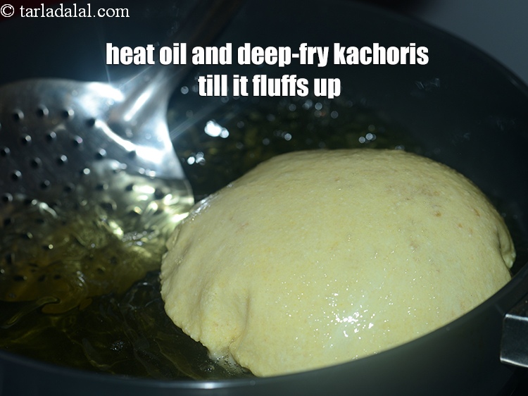 Step 26 – Heat the oil in a kadhai and deep-fry the kachoris one at a time on …