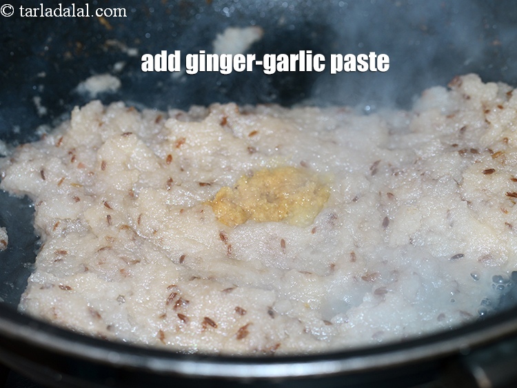 Step 24 – Add 1 tsp <a href="https://www.tarladalal.com/glossary-ginger-garlic-paste-adrak-lehsun-ki-pate-adrak-lahsun-ki-paste-939i">ginger-garlic (adrak-lehsun) paste</a>.