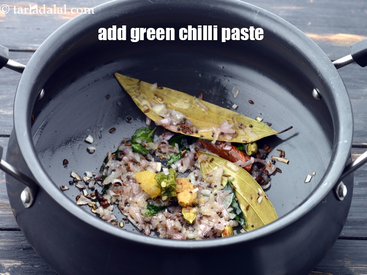 Step 24 – Add 1/2 tsp&nbsp;<a href="https://www.tarladalal.com/glossary-green-chilli-paste-hari-mirch-ki-paste-mirchi-paste-333i">green chilli paste</a>.&nbsp;