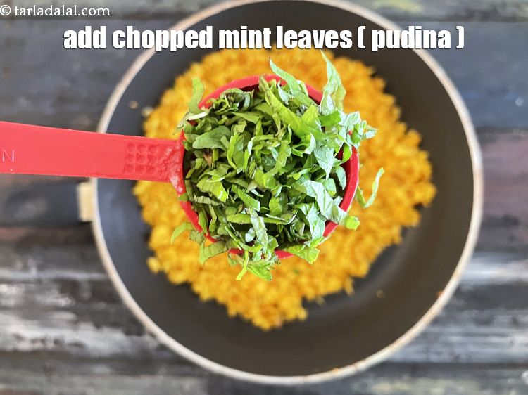 Step 26 – Add&nbsp;<meta charset="UTF-8" />1 tbsp&nbsp;finely&nbsp;<a href="glossary-chopped-mint-788i">chopped mint leaves (phudina)</a>.