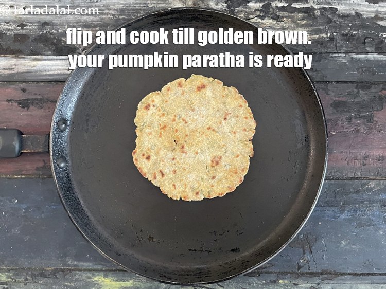 Step 25 – Flip and cook till golden brown.&nbsp;Your paratha is ready.