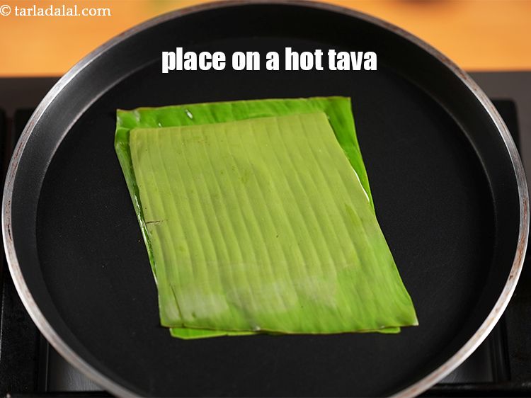 Step 26 – <meta charset="UTF-8" />Place on a hot tava.&nbsp;&nbsp;